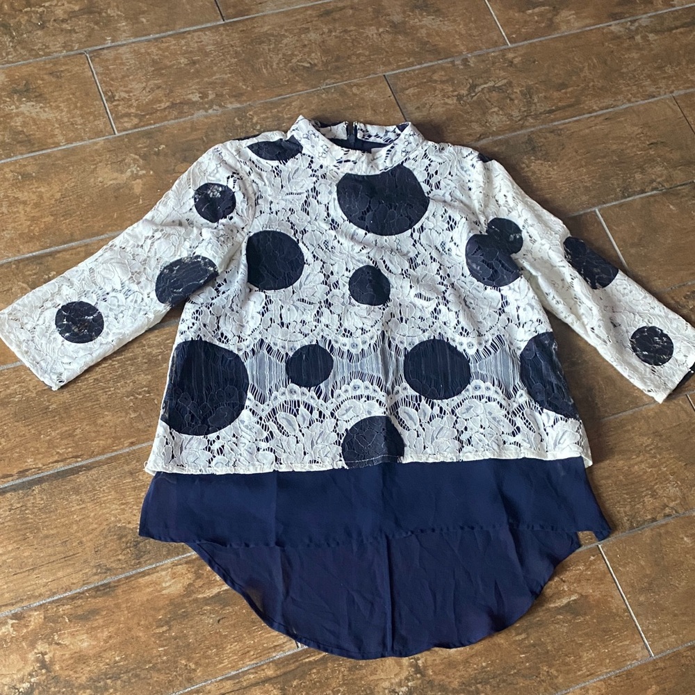 HD in Paris Elegant Lace Top with Dark Blue Accents. Size 2. Great condition.